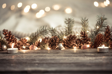 Festive New year background with cones and lights.