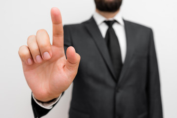 Male human with beard wear formal working suit clothes raising one hand up