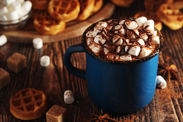 A mug with hot chocolate with marshmallow	