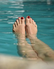 relaxing at the swimming pool with turquoise water