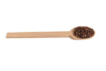 sichuan pepper in wooden spoon isolated on white background. spices and food ingredients