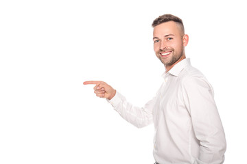 smiling businessman pointing with finger isolated on white