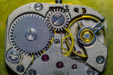 The mechanism of a wrist mechanical watch close-up.