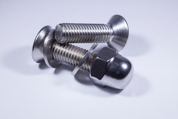 Countersunk bolts from stainless steel on a white background.