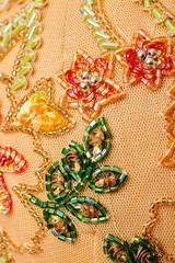 Fabric with sequins and sequins of bright colors. Fashion glitter fabric, sequins. Shiny surface