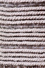 Fabric with sequins and sequins of bright colors. Fashion glitter fabric, sequins. Shiny surface