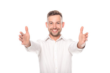 smiling businessman with outstretched hands isolated on white