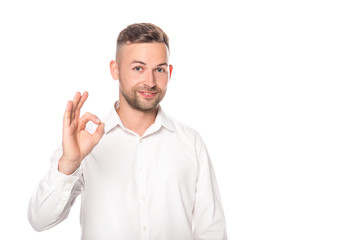 Fototapeta premium businessman showing ok sign isolated on white