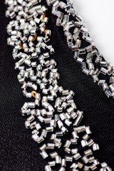 Fabric with sequins and sequins of bright colors. Fashion glitter fabric, sequins. Shiny surface