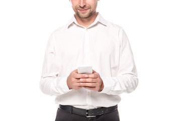 cropped view of businessman using smartphone isolated on white