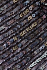 Fabric with sequins and sequins of bright colors. Fashion glitter fabric, sequins. Shiny surface