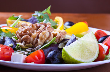 Fresh healthy raw green salad in a plate