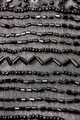 Fabric with sequins and sequins of bright colors. Fashion glitter fabric, sequins. Shiny surface