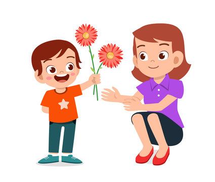 happy cute kid boy give flower to mother