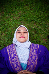 A beautiful Malay girl celebrating her graduation day.