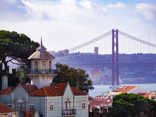 Obraz premium privileged point to observe a wonderful panorama on Lisbon and the Tagus river with its metal bridge