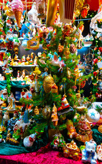 Fototapeta premium Christmas Tree Decoration on Christmas Market at Gendarmenmarkt in Winter Berlin, Germany. Advent Fair Decoration, and Stalls with Crafts Items in Bazaar. Made of glass