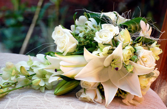 Teardrop Bridal Bouquet of White Oriental Lilies, Roses, Orchids and Brunia Berries. Wedding Flowers. 