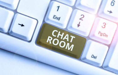 Writing note showing Chat Room. Business concept for area on the Internet or computer network where users communicate White pc keyboard with note paper above the white background