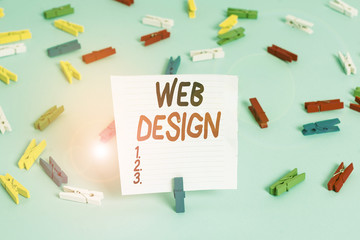 Word writing text Web Design. Business photo showcasing Website development Designing and process of creating websites Colored clothespin papers empty reminder blue floor background office pin