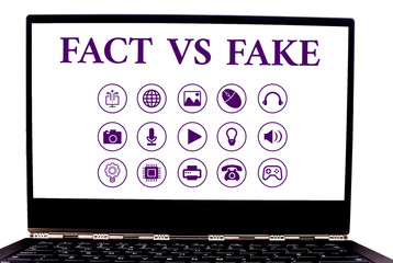 Conceptual hand writing showing Fact Vs Fake. Concept meaning Rivalry or products or information...