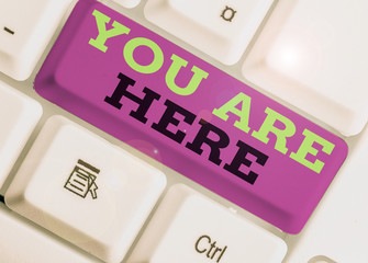 Handwriting text You Are Here. Conceptual photo This is your location reference point global...