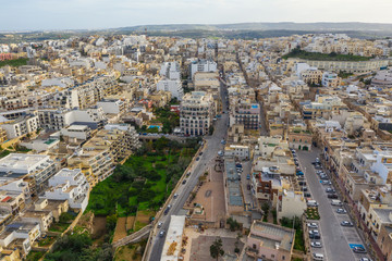 Fototapeta na wymiar Aerial view of Melieha city. Blue sky, sea, day. Malta country