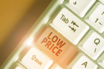 Obraz premium Writing note showing Low Price. Business concept for Price are the lowest in relation to other things of same kind