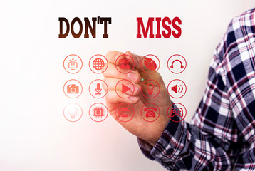 Conceptual hand writing showing Don T Miss. Concept meaning comanalysisding them not to miss out an...