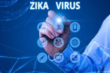 Conceptual hand writing showing Zika Virus. Concept meaning caused by a virus transmitted primarily...