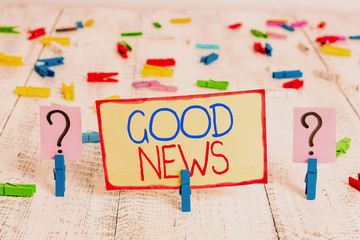Word writing text Good News. Business photo showcasing Someone or something positive Encouraging uplifting or desirable Scribbled and crumbling sheet with paper clips placed on the wooden table