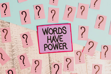 Handwriting text Words Have Power. Conceptual photo Energy Ability to heal help hinder humble and humiliate Scribbled and crumbling papers with thick cardboard above wooden table