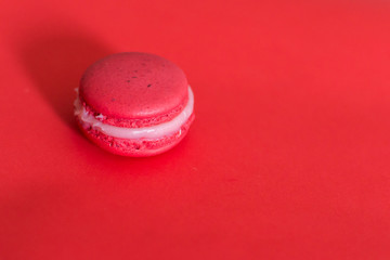 macarons frances rosado con fondo rosado