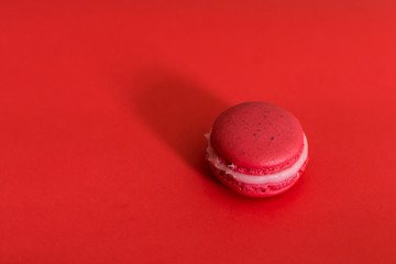 macarons frances rosado con fondo rosado