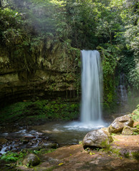 Fototapeta na wymiar Mahua Waterfall is a plunge type waterfall located in Patau Village, Tambunan District of Sabah, Malaysia within the Crocker Range National Park administered by Sabah Parks.