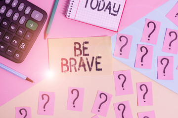Conceptual hand writing showing Be Brave. Concept meaning ready to face and endure danger or pain showing courage Bold Mathematics stuff and writing equipment on pastel background