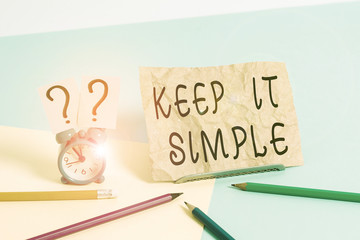 Conceptual hand writing showing Keep It Simple. Concept meaning Remain in the simple place or...