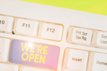 Conceptual hand writing showing We Re Open. Concept meaning answering on client that shop is...