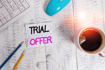 Handwriting text writing Trial Offer. Conceptual photo A temporary free or discounted offer of a product or services technological devices colored reminder paper office supplies keyboard mouse