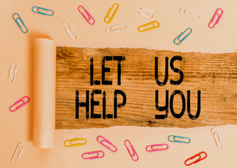 Conceptual hand writing showing Let Us Help You. Concept meaning Offering a service to someone to...