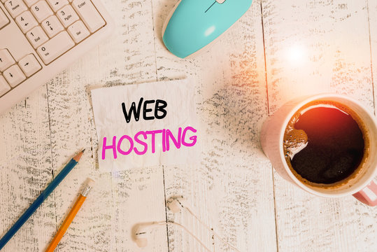 Handwriting text writing Web Hosting. Conceptual photo business of providing storage space and access for websites technological devices colored reminder paper office supplies keyboard mouse