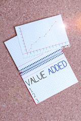 Text sign showing Value Added. Business photo showcasing the extra value created over and above the...