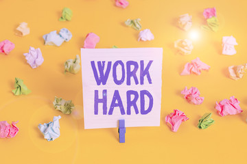 Word writing text Work Hard. Business photo showcasing Laboring that puts effort into doing and...
