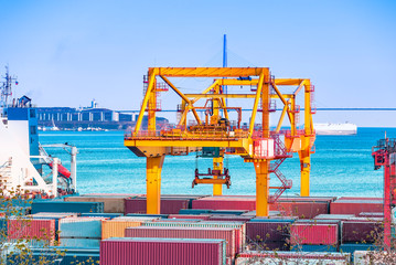 industrial sea port with containers and cranes