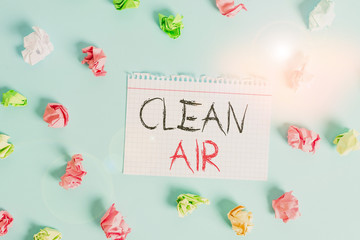 Word writing text Clean Air. Business photo showcasing air that has no harmful levels of dirt and chemicals in it Colored crumpled rectangle shaped reminder paper light blue background