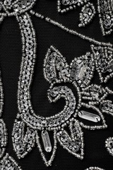 Fabric with sequins and sequins of bright colors. Fashion glitter fabric, sequins. Shiny surface