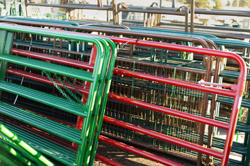 Colorful fence panels in the sale yard of a farm and ranch store in rural Elizabeth, Colorado