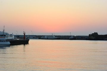 Fototapeta na wymiar Sunrise over the port of Yalta