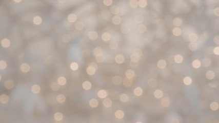 Out of focus twinkling holiday lights in a warm orange color. Great for text and graphics.