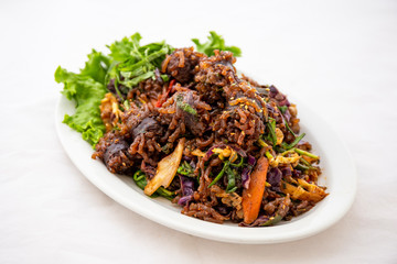 Stir-fried spicy Korean blood sausage which is called Sundae in Korea